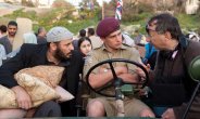 Kosminsky (on right) directs Ali Suliman and Christian Cooke in The Promise